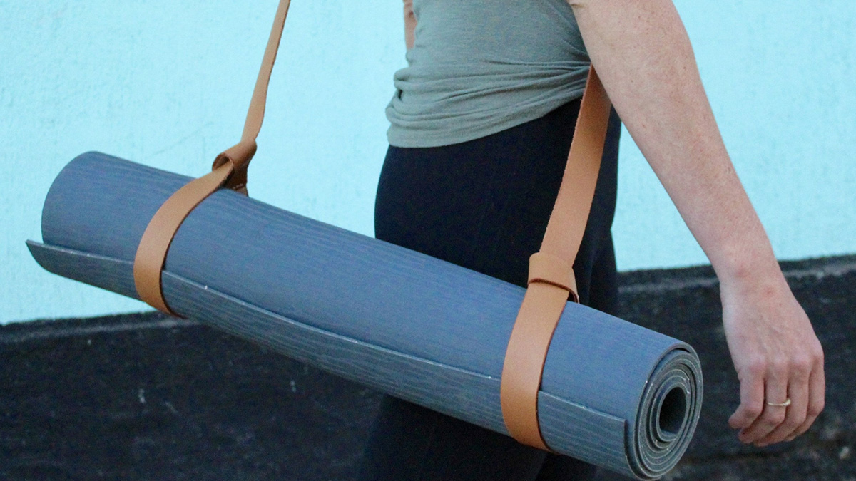 How to Use a Yoga Strap to Carry Your Mat